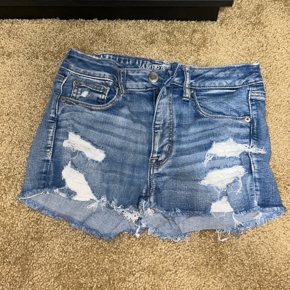 High rise shortie shorts with lace pockets